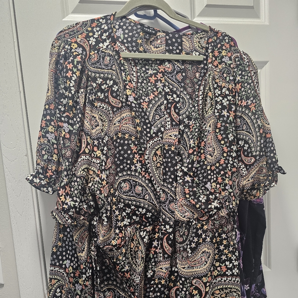 Surpice top with ruffle sleeves.